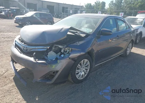 2014 Toyota Camry Le z USA, uszkodzony, nr VIN 4T4BF1FK7ER393891